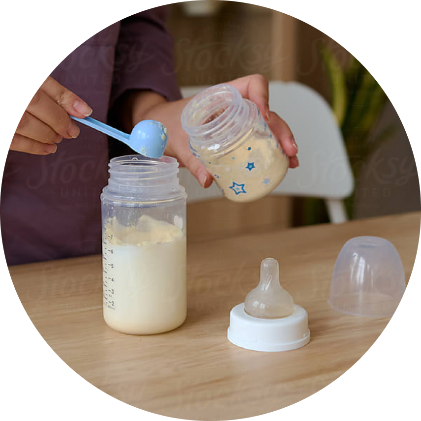 Preparation of hypoallergenic-milk formula in a baby bottle.